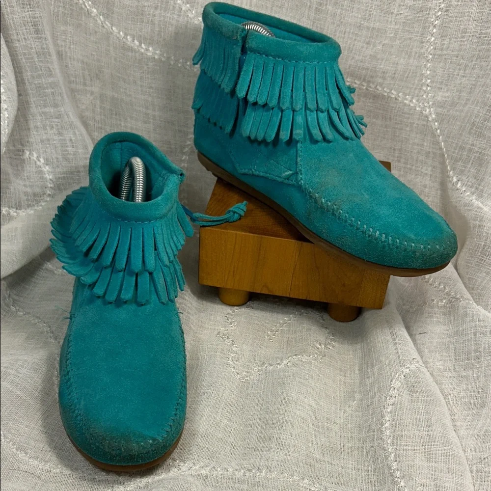 Minnetonka leather fringe moccasins with side zipper